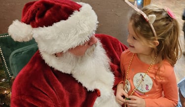 Santa Tom Talking with little girl