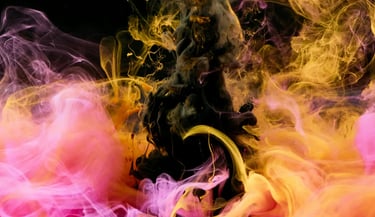 Colorful abstract smoke clouds in pink, yellow and black artistic composition