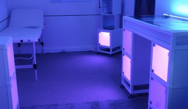 A modern escape-room with white medical furniture illuminated