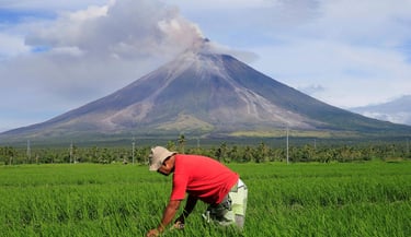 Farmer Mayon Volcano in Background