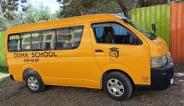 Yellow school van for Duma School from Vanna Ventures