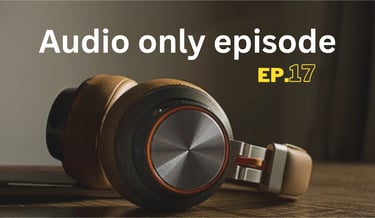 a pair of headphones with a laptop and headphones on a table