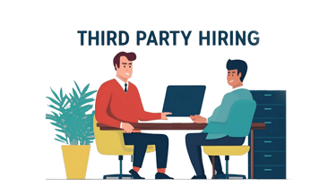 a man and woman sitting at a table with a laptop