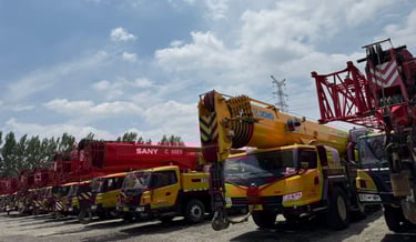 a crane is parked in a lot with many other cranes