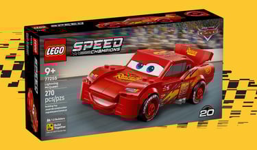 Front of LEGO set 77255: Lightning McQueen on box with racing track and Rust-eze logo.