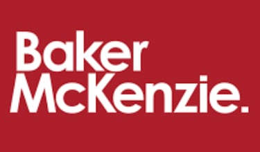 a baker's mckenziee logo on a red background corporasti