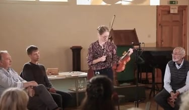 Charlotte Rowan, violinist giving talk on violin making for Orkney International Science Festival