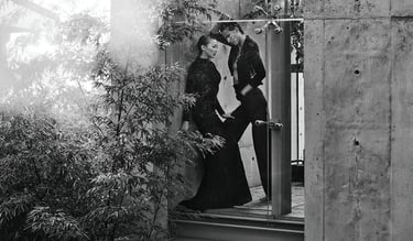 Elizabeth Lotz (Liz Lotz) art director fashion editorial in architectural landscape with two models in black and white elegan