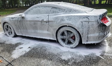 Ford Mustang in soapy foam