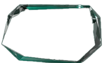 a glass vase with a green background