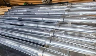 Finished barbells packaged for bulk shipment and wholesale distribution