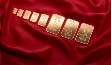 gold bars layed out in a row symbolizing blog post augusta precious metals, a gold ira company and why you should choose them