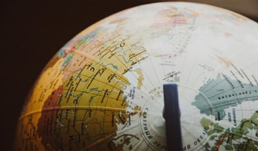 globe showing different countries and nations representing Gold IRA and geopolitical risk