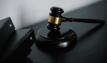 a gavel on a desk showing gold ira regulations and compliance
