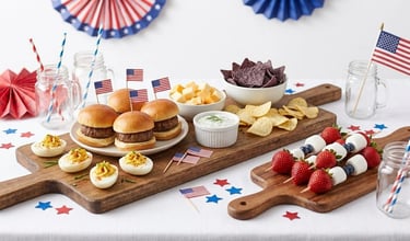 Easy 4th of July finger foods including mini sliders, deviled eggs, and fruit skewers.