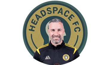 a man with a headspacer and a headset on a green background