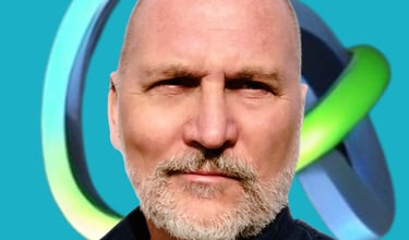 Vlad Hunter Lodzinski, Stelarator CEO against it's logo background, a determined looking exec