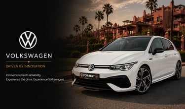 White Volkswagen Golf car for rent parked in front of a luxury resort with palm trees at sunset.