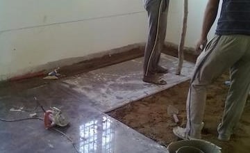 Kota stone installation in hospital interior.