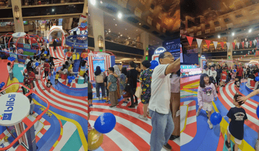 Crowd of mall visitors watching interactive Independence Day games at Blibli booth