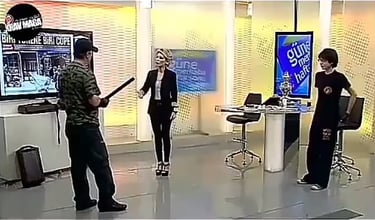 a man and woman in a tv studio
