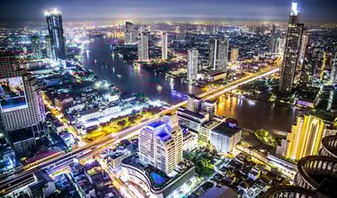 City and river view of Bangkok at night.