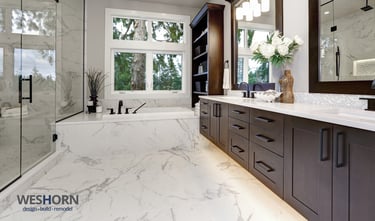 Luxury bathroom renovation with frameless glass shower and heated tile floors in Lake Forest IL.