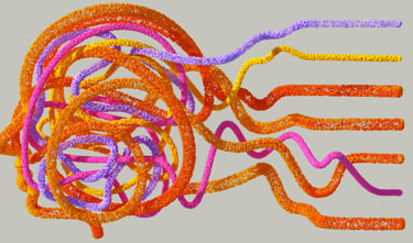 a bunch of coloured yarn jumbled in the shape of a head