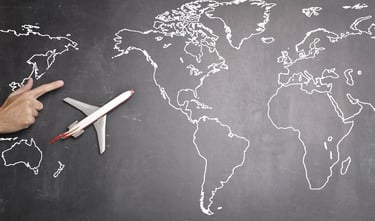 a plane flying over a chalkboard with a plane
