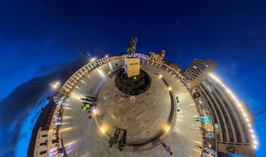 Panoramic 360 view of Plaza de Bolivar in Tunja, Colombia at night with the equestrian statue.