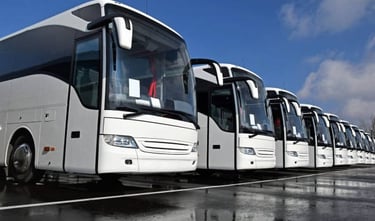 a row of buses parked in a row