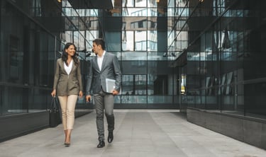 Business professionals, walking through office building with cloud base cameras, monitoring premises
