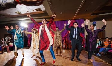 a group of people dancing and dancing on a dance floor