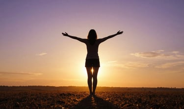 woman with open arms at twilight representing shadow integration and wholeness achieved