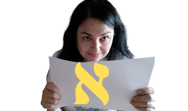 a woman holding a paper with a yellow x on it