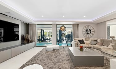 Cinema room next to indoor pool and gym at Villa Serenity