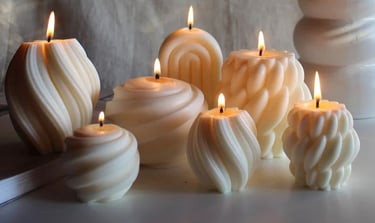 Molded white wax scented candles