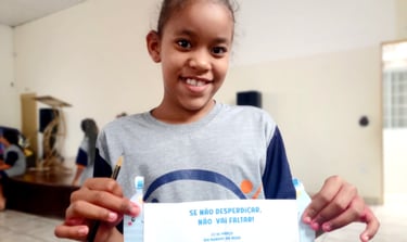 a young girl holding a sign that says, it's not a sign