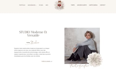 Professional woman posing for a portrait in a modern photography studio.