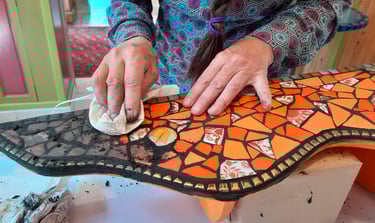 a woman is using a piece of art