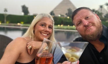a man and woman are sitting at a table