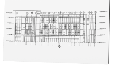 Detailed architectural building elevation drawing on a digital screen showing floor levels and structural plans.