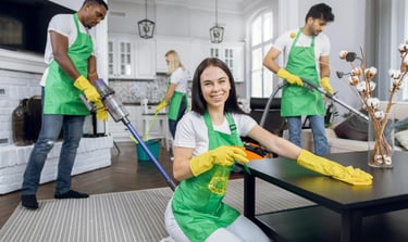 woman and crew cleaning a residential property