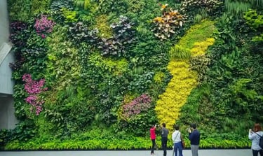 A lush, vibrant vertical garden on a modern building wall 16 * 9