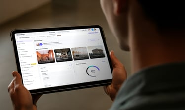 a person holding a tablet with a tablet on it