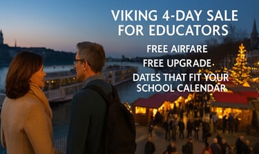 Teachers at a European riverfront with Viking ship at dusk