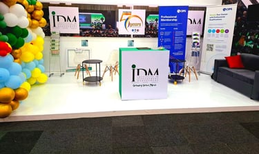 a large display of various balloons and balloons and a promotiona stand