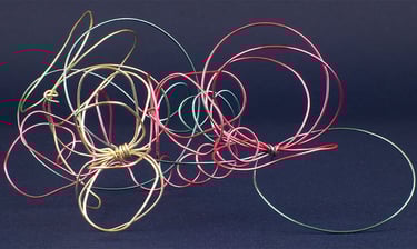 Abstract metal wire sculpture representing a motorcycle