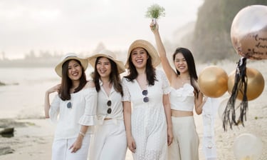 Bachelorette party walking through cliff landscape at Melasti Beach Bali