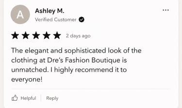 A five-star customer review for Dre's Fashion Boutique praising their elegant and sophisticated clothing collection.